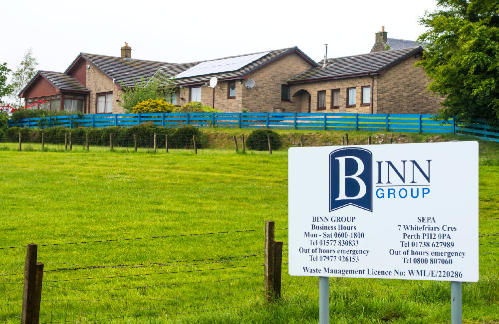 Binn Group Binn Farm showing house and notice board with contact details